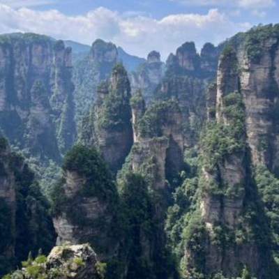 Zhangjiajie Essential Tour: Forest Park + Charming Xiangxi + Tianmen Mountain + Grand Canyon + Heifeng Cave Adventure (4 Days, 3 Nights)