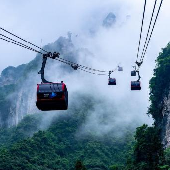Lo más destacado de la esencia de Zhangjiajie en 1 día privado: montaña Tianmen, puente de cristal del Gran Cañón y el espectáculo The Romance