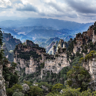 Zhangjiajie Essential Tour: Forest Park + Charming Xiangxi + Tianmen Mountain + Grand Canyon + Heifeng Cave Adventure (4 Days, 3 Nights)