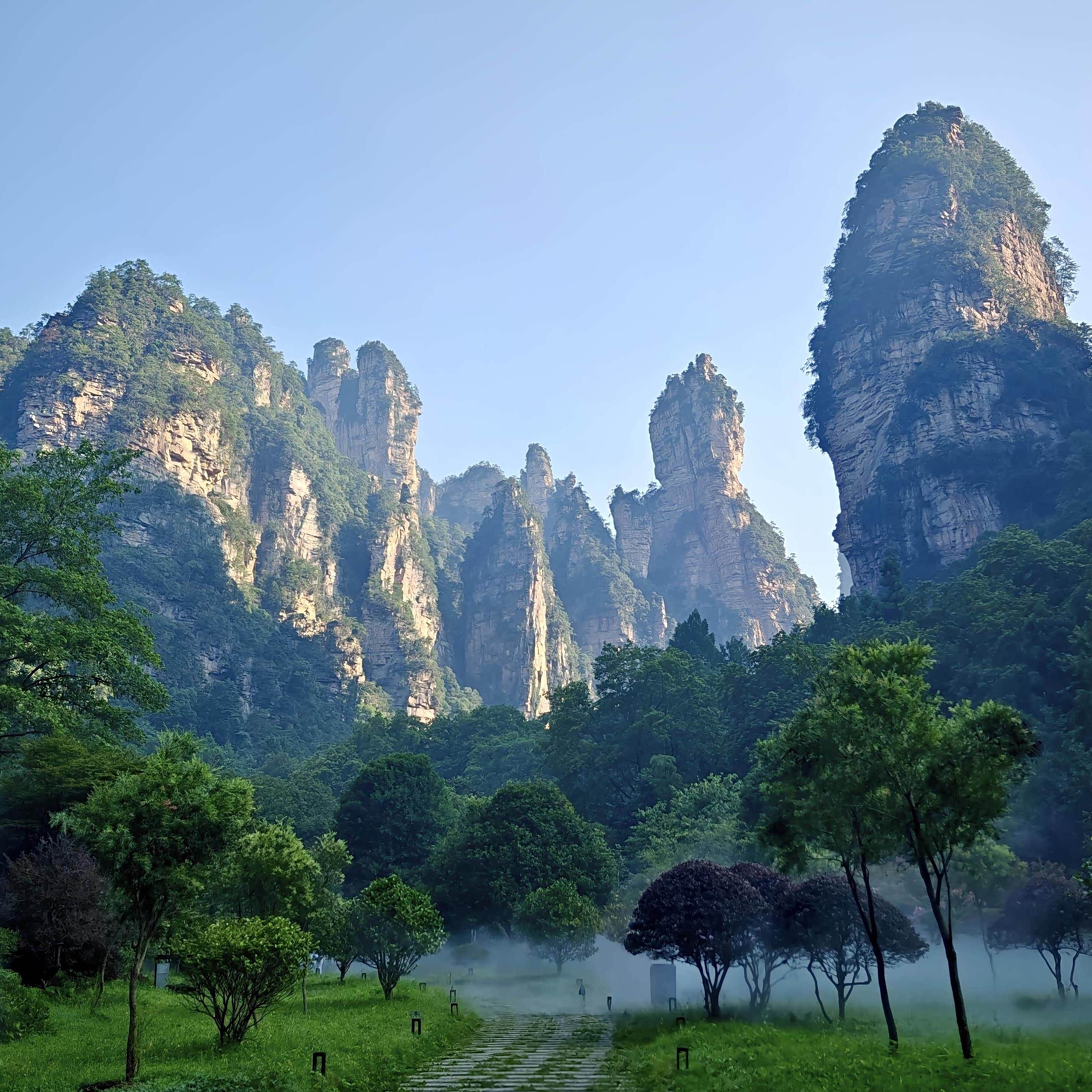 Zhangjiajie Essential Tour: Forest Park + Charming Xiangxi + Tianmen Mountain + Grand Canyon + Heifeng Cave Adventure (4 Days, 3 Nights)