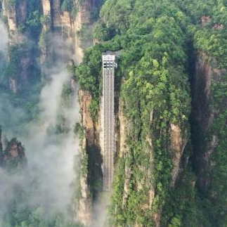 Lo más destacado de la esencia de Zhangjiajie en 1 día privado: montaña Tianmen, puente de cristal del Gran Cañón y el espectáculo The Romance